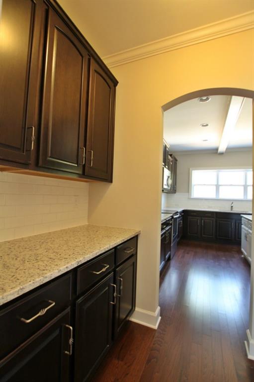 2191 Bluebell Way, Unit 11 Tega Cay, SC 29708 - Photo 6 of 14 a kitchen with stainless steel appliances granite countertop a cabinets