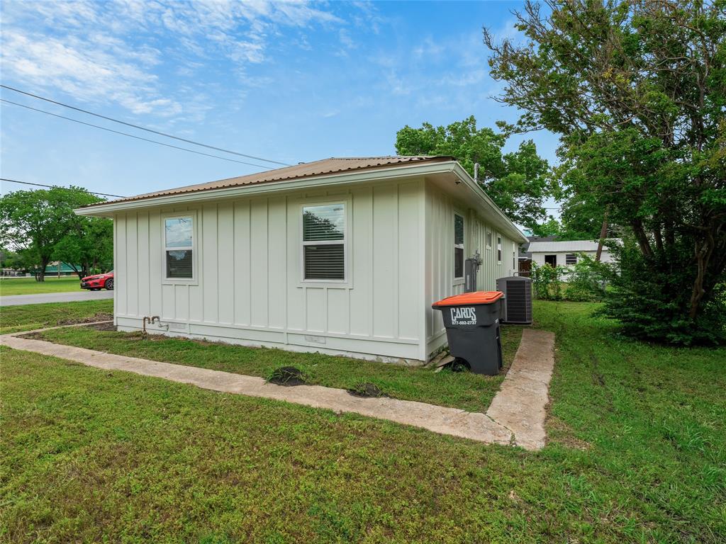 421 South Interurban Street Anna, TX 75409 - Photo 24 of 27 a view of a house with a yard