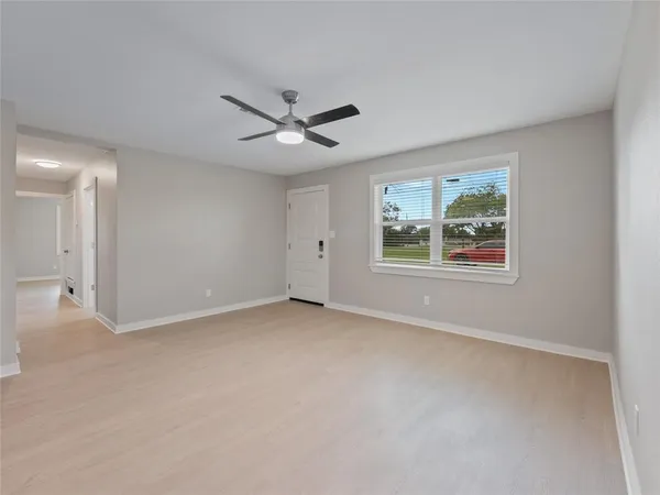 a kitchen with a sink stainless steel appliances and cabinets