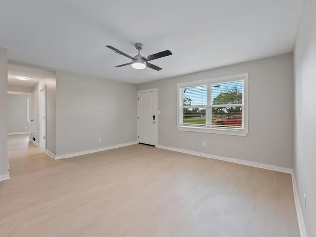a kitchen with a sink stainless steel appliances and cabinets