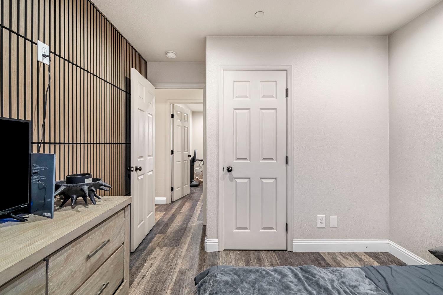 25802 El Monte Way Madera, CA 93638 - Photo 18 of 39 bedroom featuring baseboards and dark wood finished floors