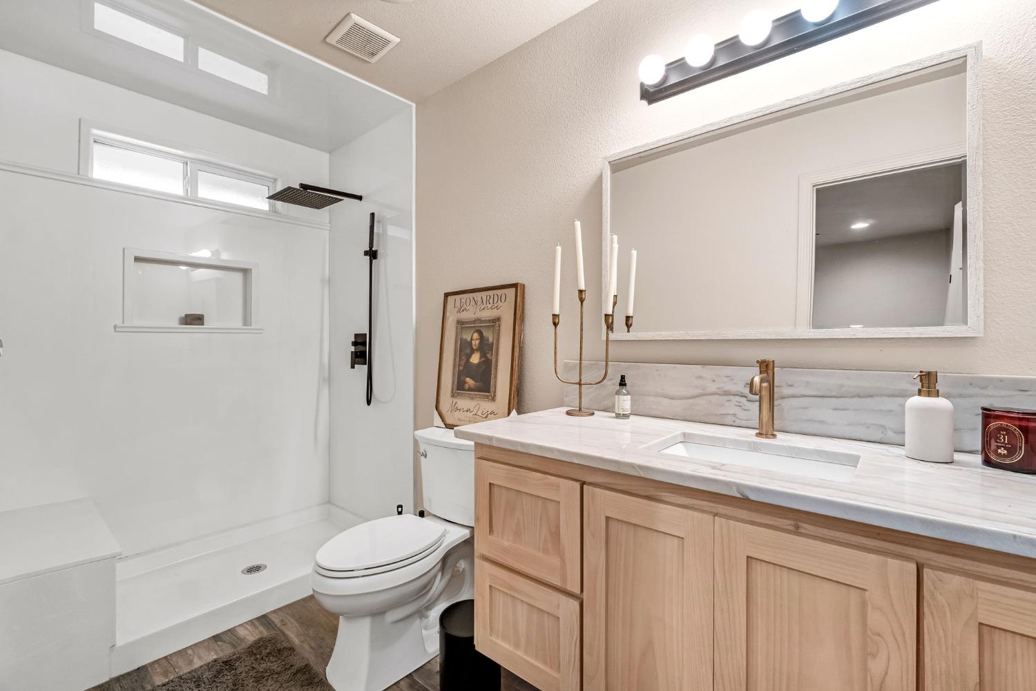 25802 El Monte Way Madera, CA 93638 - Photo 25 of 39 full bath with vanity, walk in shower, and dark wood-type flooring