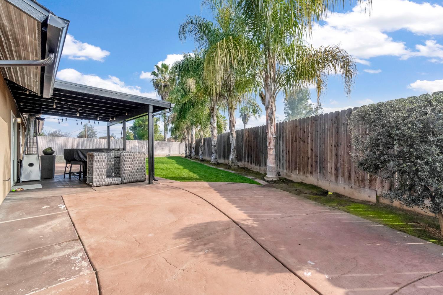 25802 El Monte Way Madera, CA 93638 - Photo 29 of 39 fenced backyard featuring a patio area
