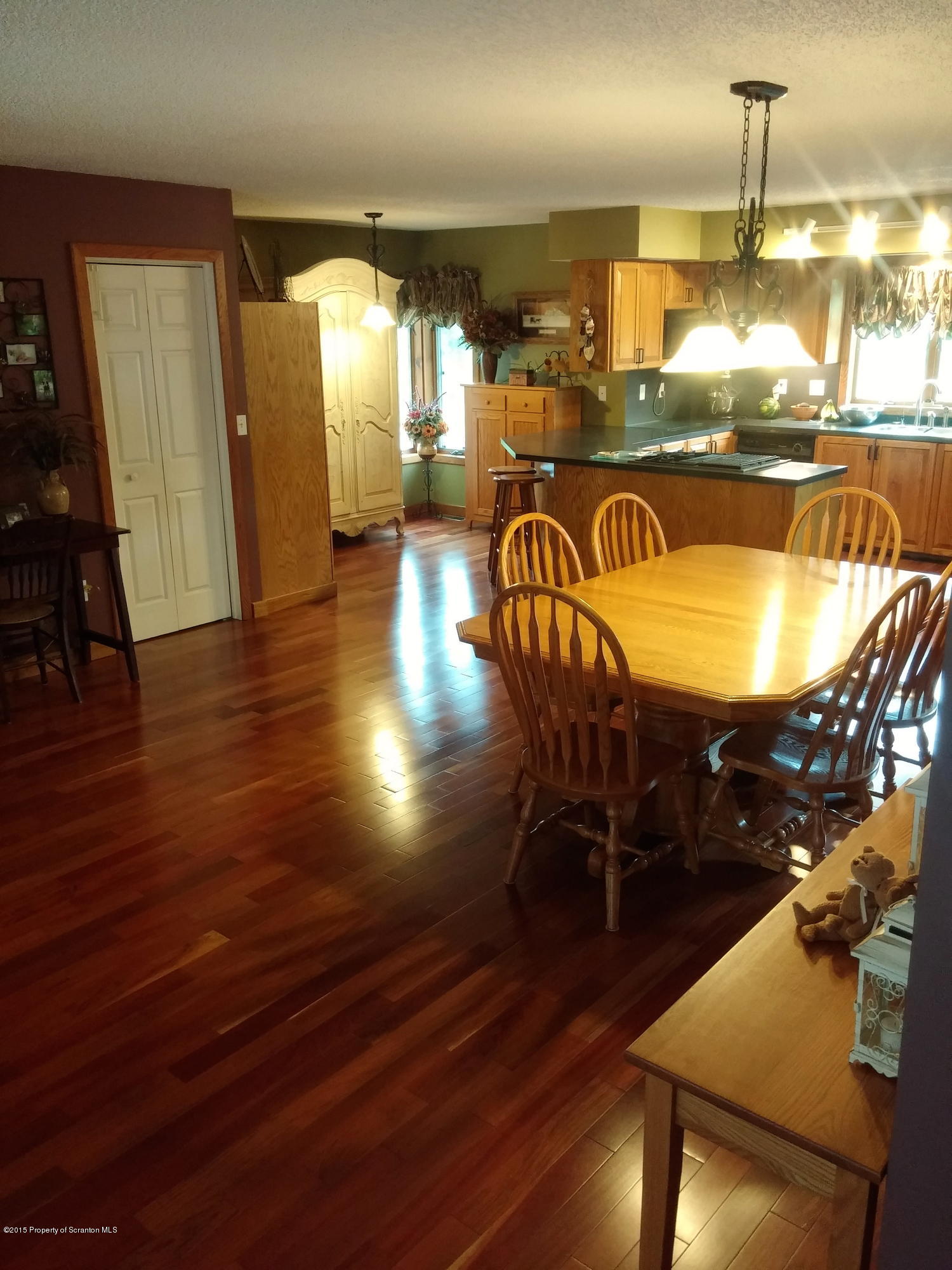 102 Moon Road Lake Ariel, PA 18436 - Photo 54 of 76 a view of a dining room with furniture and wooden floor