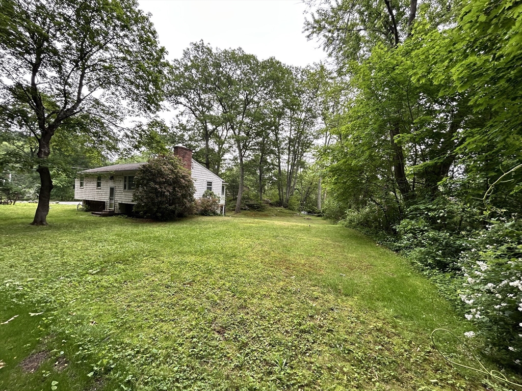 58 Summer Hill Road Maynard, MA 01754 - Photo 3 of 15 a view of a house with a yard