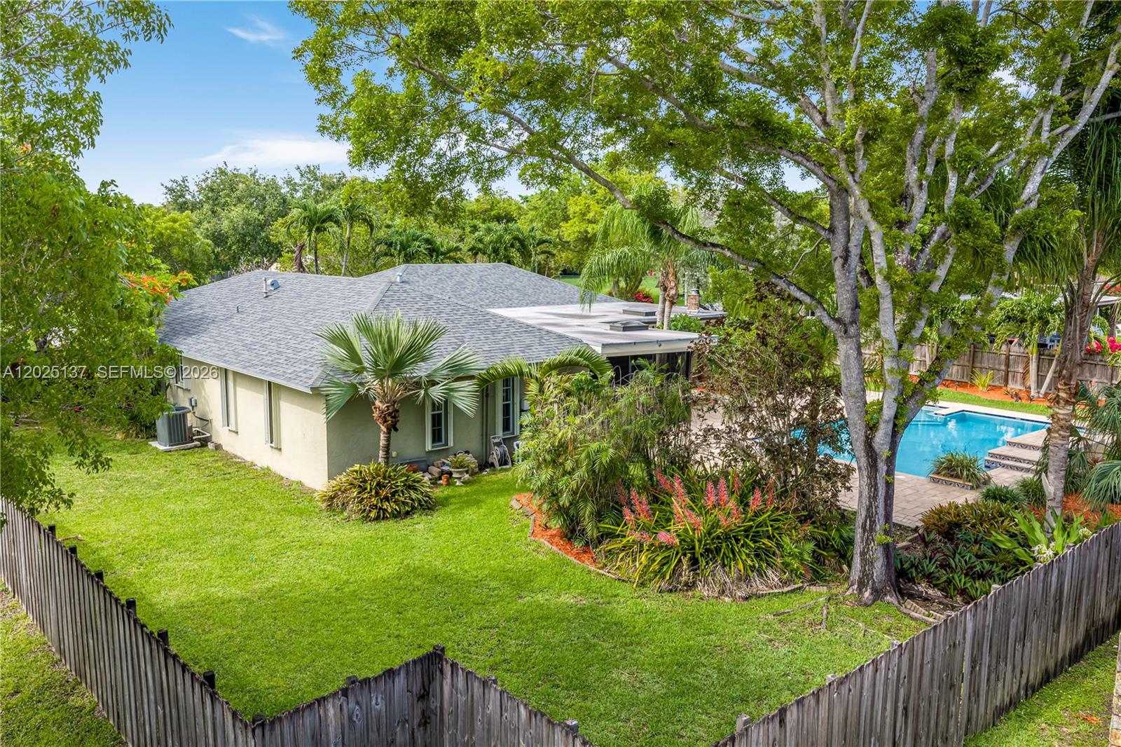 11480 Southwest 96th Terrace Miami, FL 33176 - Photo 3 of 54 a view of a house with a yard