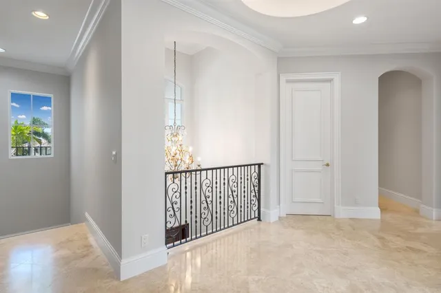 a view of room with window and ceiling fan