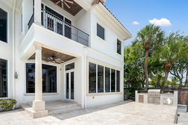 a view of a house with a yard and a garage