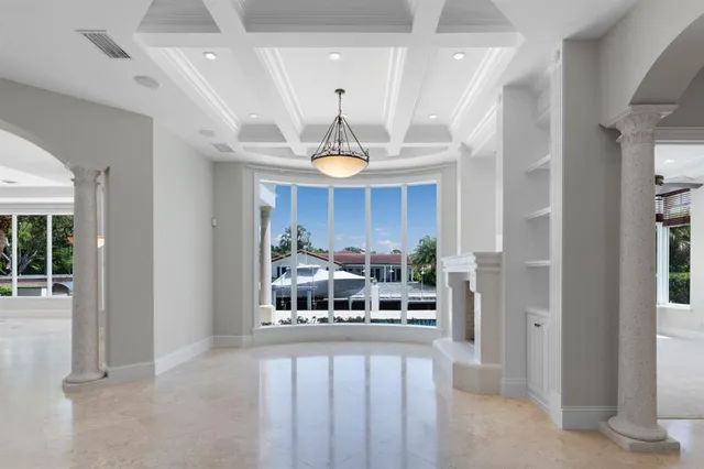 a view of entryway and hall with a front door