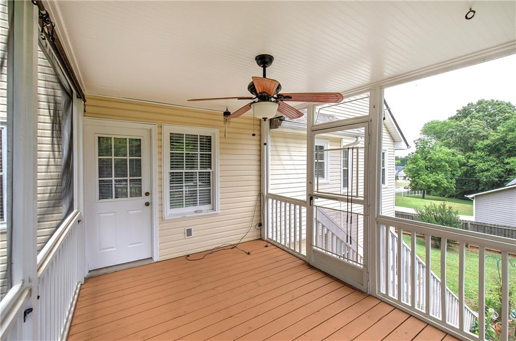 218 Gilreath Road Southeast Cartersville, GA 30121 - Photo 23 of 27 a view of empty room with wooden floor and fan
