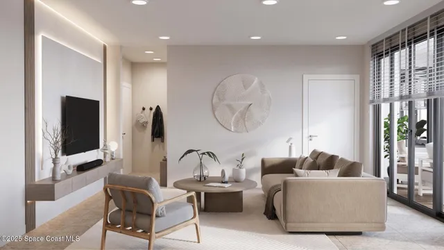 a living room with fireplace furniture and a flat screen tv