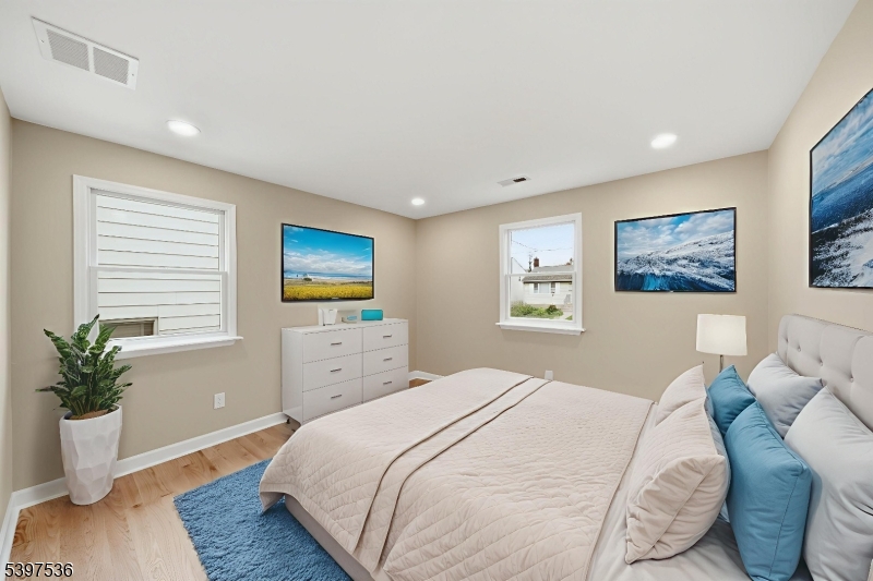 2535 Standish Avenue Union, NJ 07083 - Photo 15 of 45 a bedroom with a large bed and a window