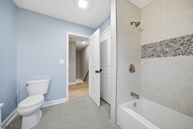 2535 Standish Avenue Union, NJ 07083 - Photo 24 of 45 a bathroom with a toilet and shower