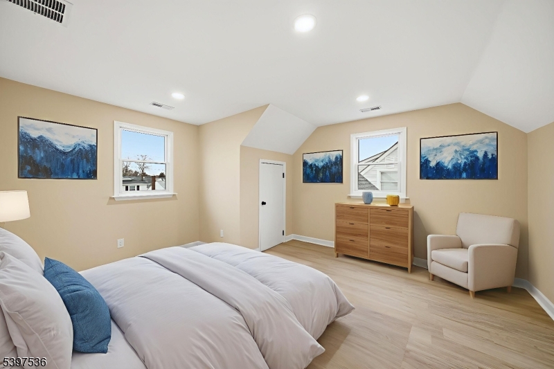 2535 Standish Avenue Union, NJ 07083 - Photo 26 of 45 a bedroom with a bed couch and a window