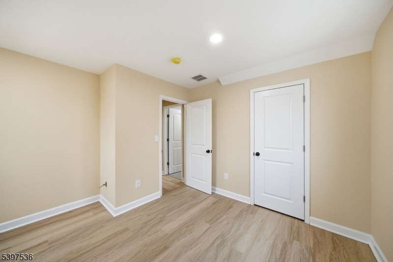 2535 Standish Avenue Union, NJ 07083 - Photo 30 of 45 a view of an empty room with wooden floor