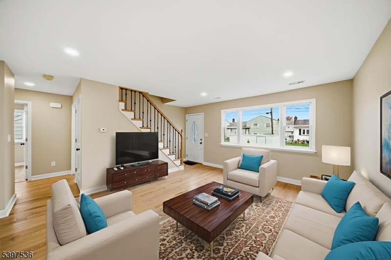 2535 Standish Avenue Union, NJ 07083 - Photo 3 of 45 a living room with furniture and a flat screen tv