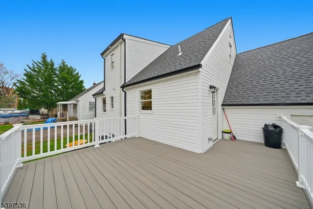 a front view of house with yard and outdoor seating