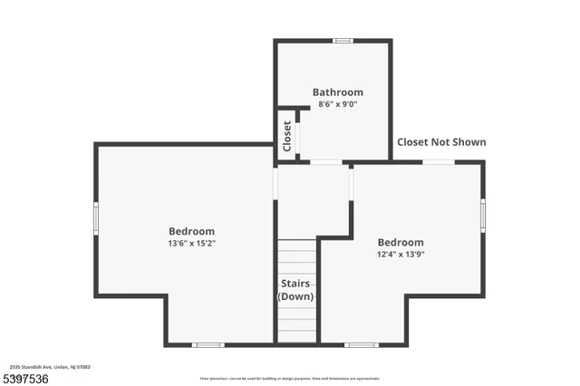 a picture of a room with a white wall and white cabinet