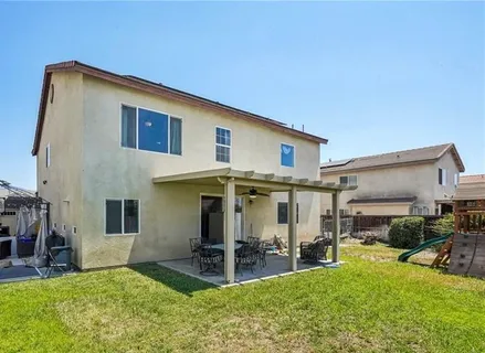 a view of a house with patio
