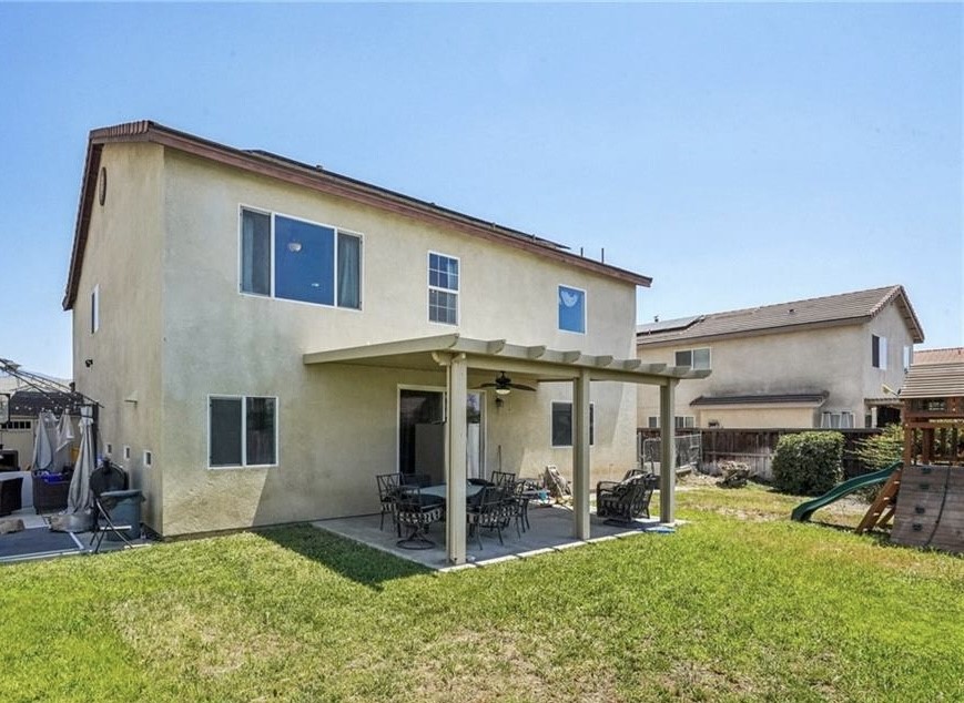 176 Nightfall Road San Jacinto, CA 92582 - Photo 11 of 11 a view of a house with patio
