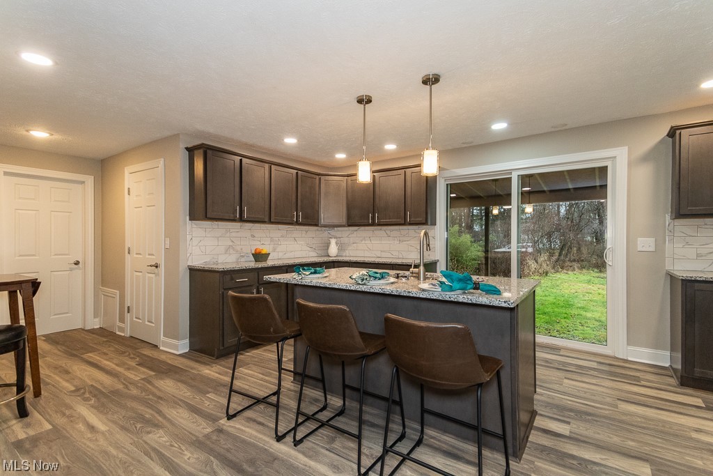 9865 Chillicothe Road Kirtland, OH 44094 - Photo 4 of 36 Granite countertops and beautiful backsplash