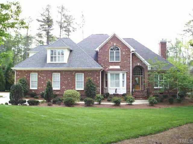 620 Pendleton Lake Road Raleigh, NC 27614 - Photo 1 of 1 a front view of a house with a garden and plants