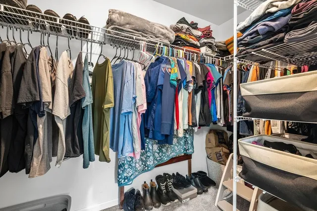 a workspace with furniture and a gate