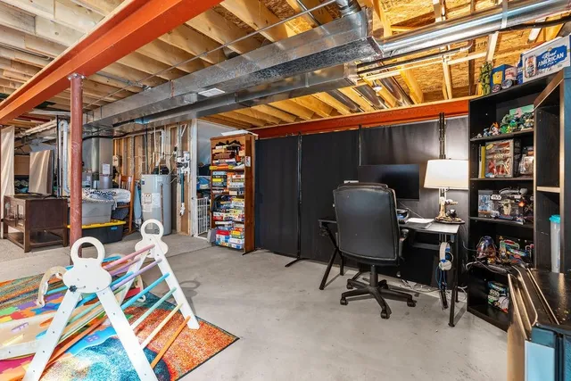 an aerial view of a house with a swimming pool