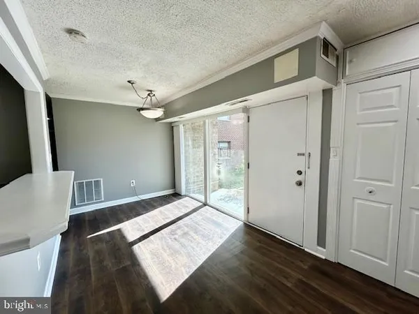 a view of an empty room and window