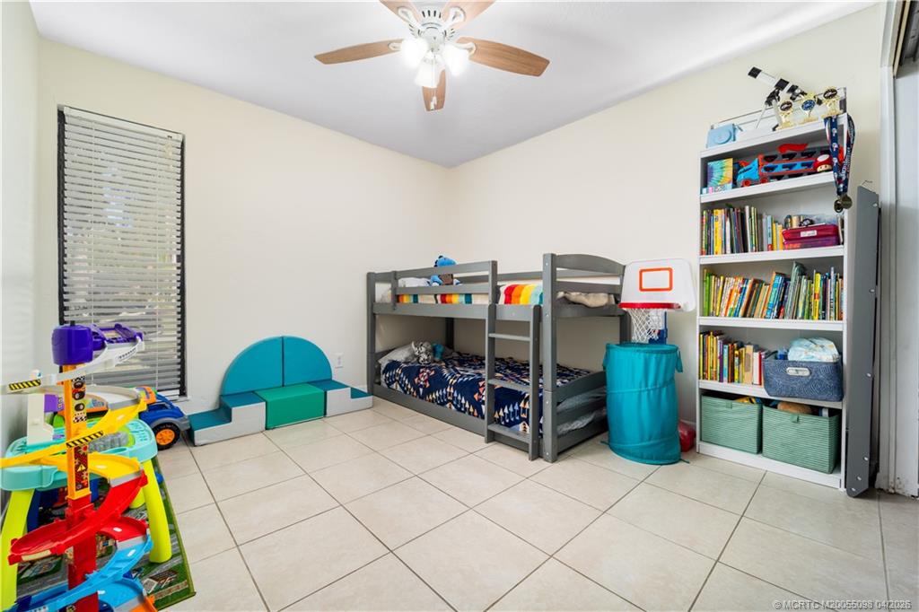 656 Southeast Ron Rico Terrace Port St. Lucie, FL 34983 - Photo 11 of 20 a view of store room with toys