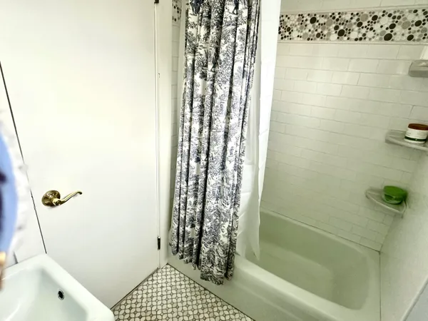 a kitchen with stainless steel appliances a stove and a refrigerator