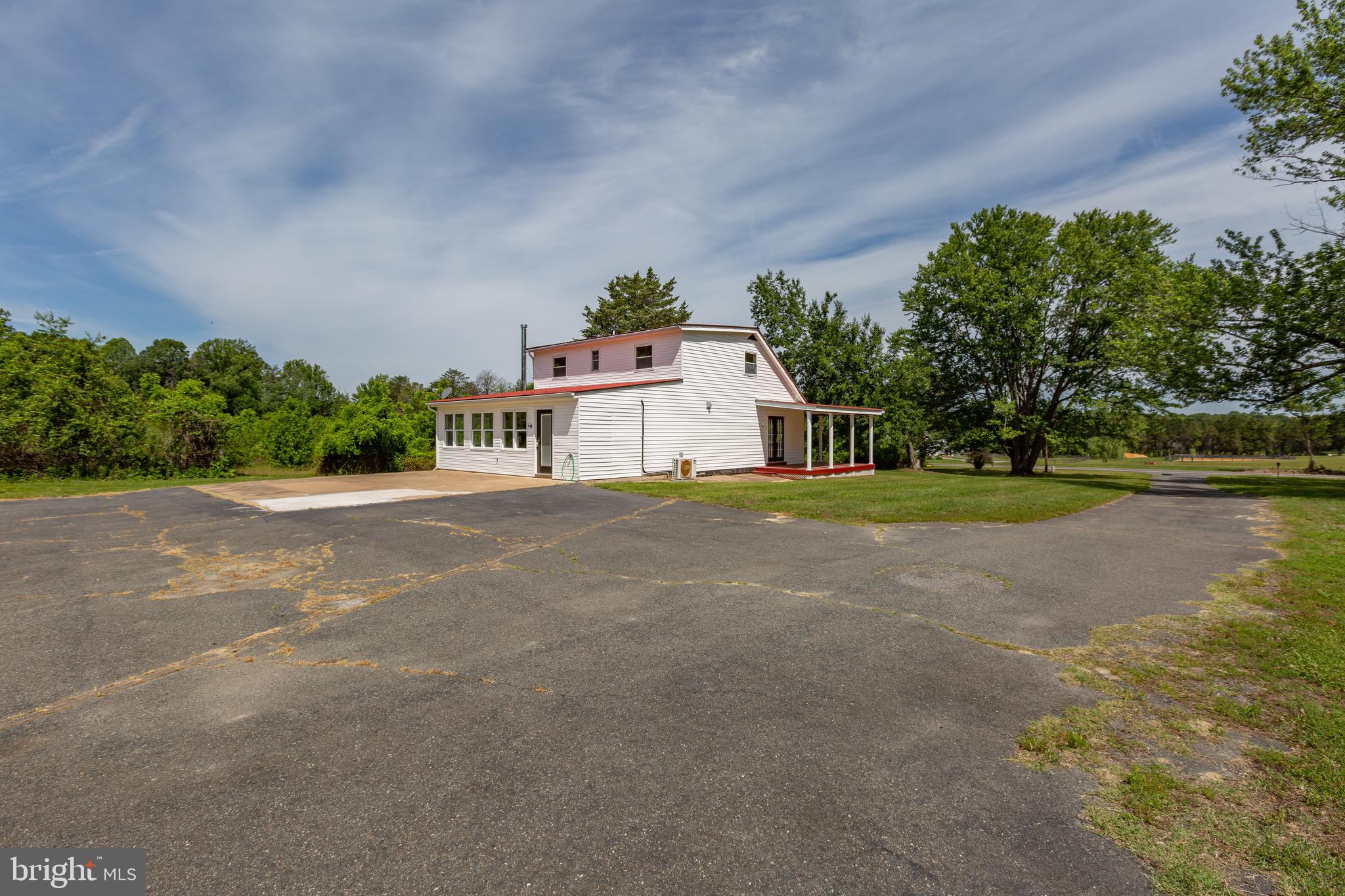 10827 Catharpin Road Spotsylvania, VA 22553 - Photo 10 of 39 a view of a house with a big yard