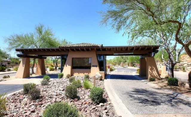 a view of a lake with a house swimming pool and outdoor space