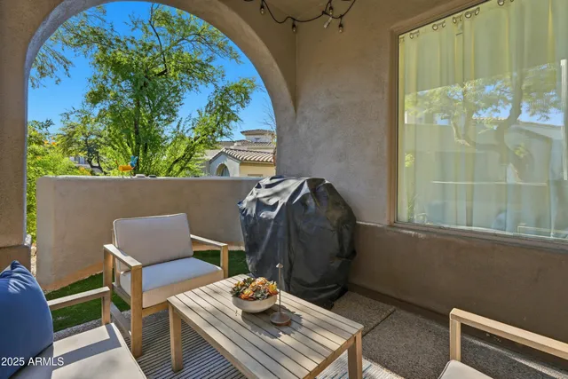 a view of entryway with wooden floor and stairs