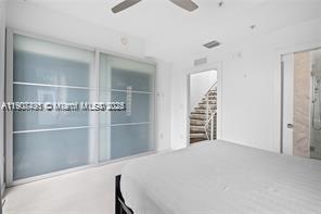 1600 Michigan Avenue, Unit 7 Miami Beach, FL 33139 - Photo 20 of 28 a view of a room with rack on the wall