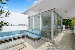 1600 Michigan Avenue, Unit 7 Miami Beach, FL 33139 - Photo 5 of 28 a outdoor living space with furniture and a potted plant