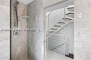 1600 Michigan Avenue, Unit 7 Miami Beach, FL 33139 - Photo 9 of 28 a view of staircase with white walls