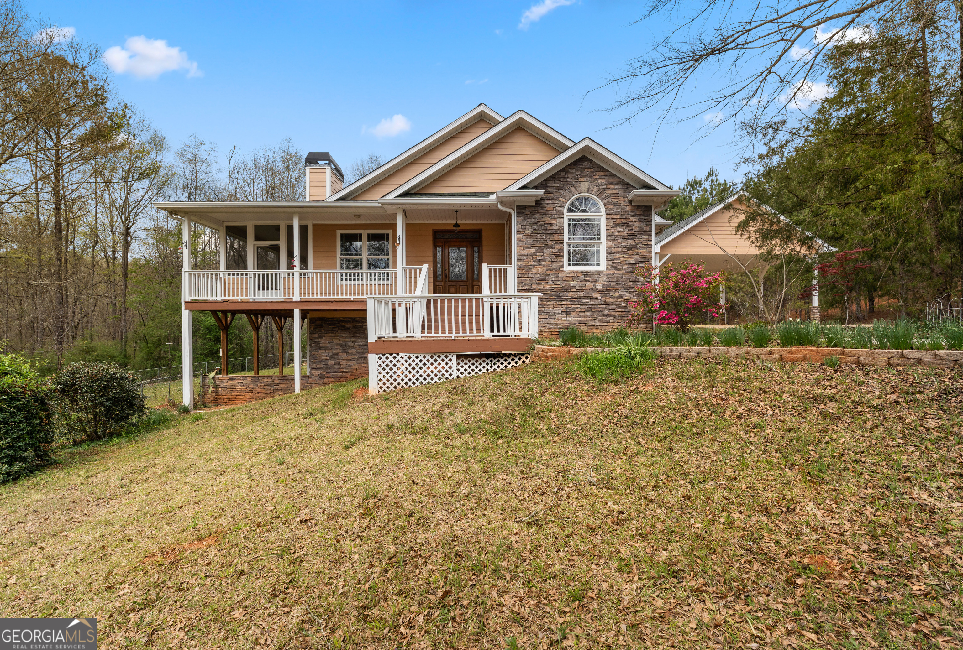 1229 Boggus Road Franklin, GA 30217 - Photo 2 of 68 a front view of a house with a yard