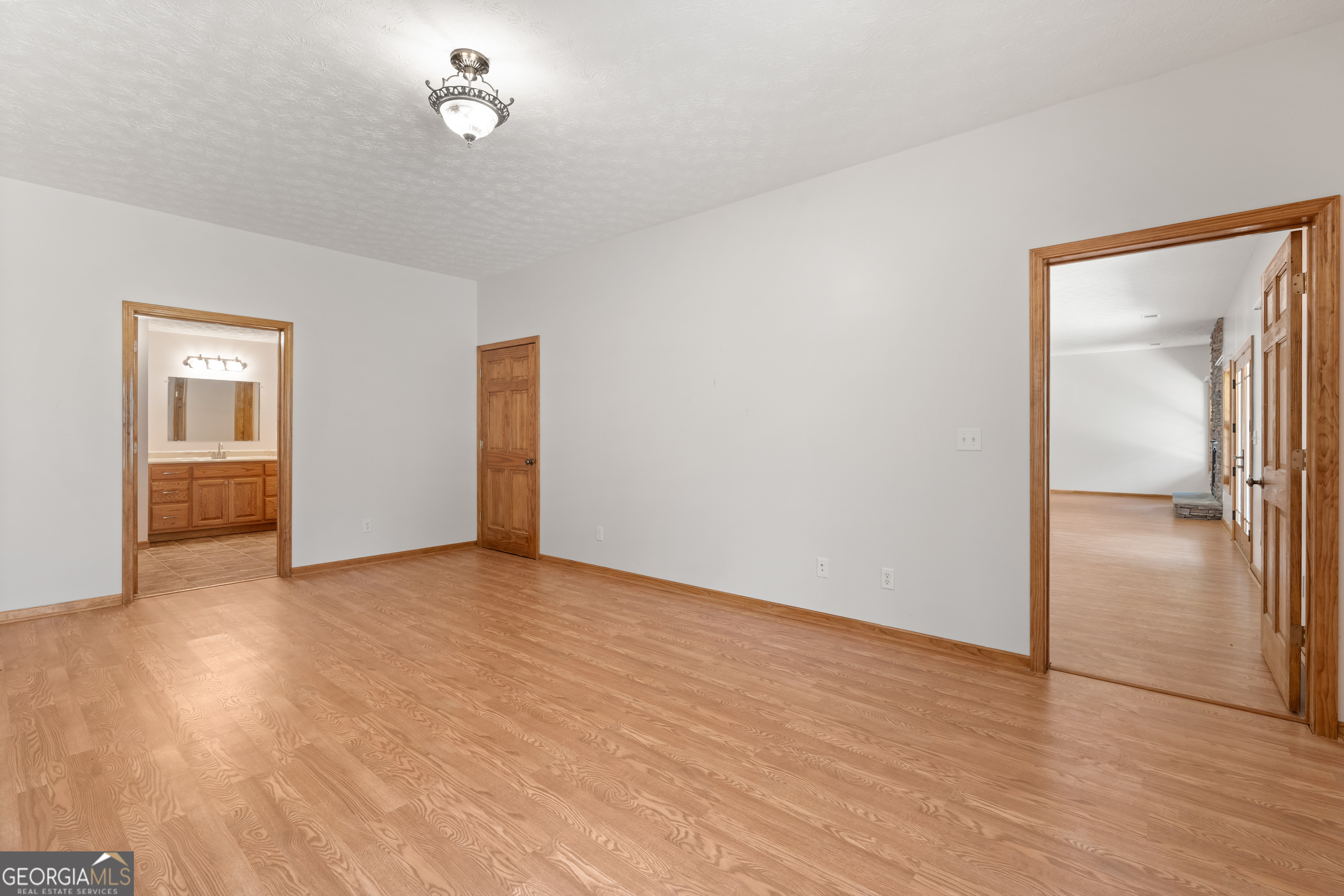 1229 Boggus Road Franklin, GA 30217 - Photo 37 of 68 wooden floor in an empty room