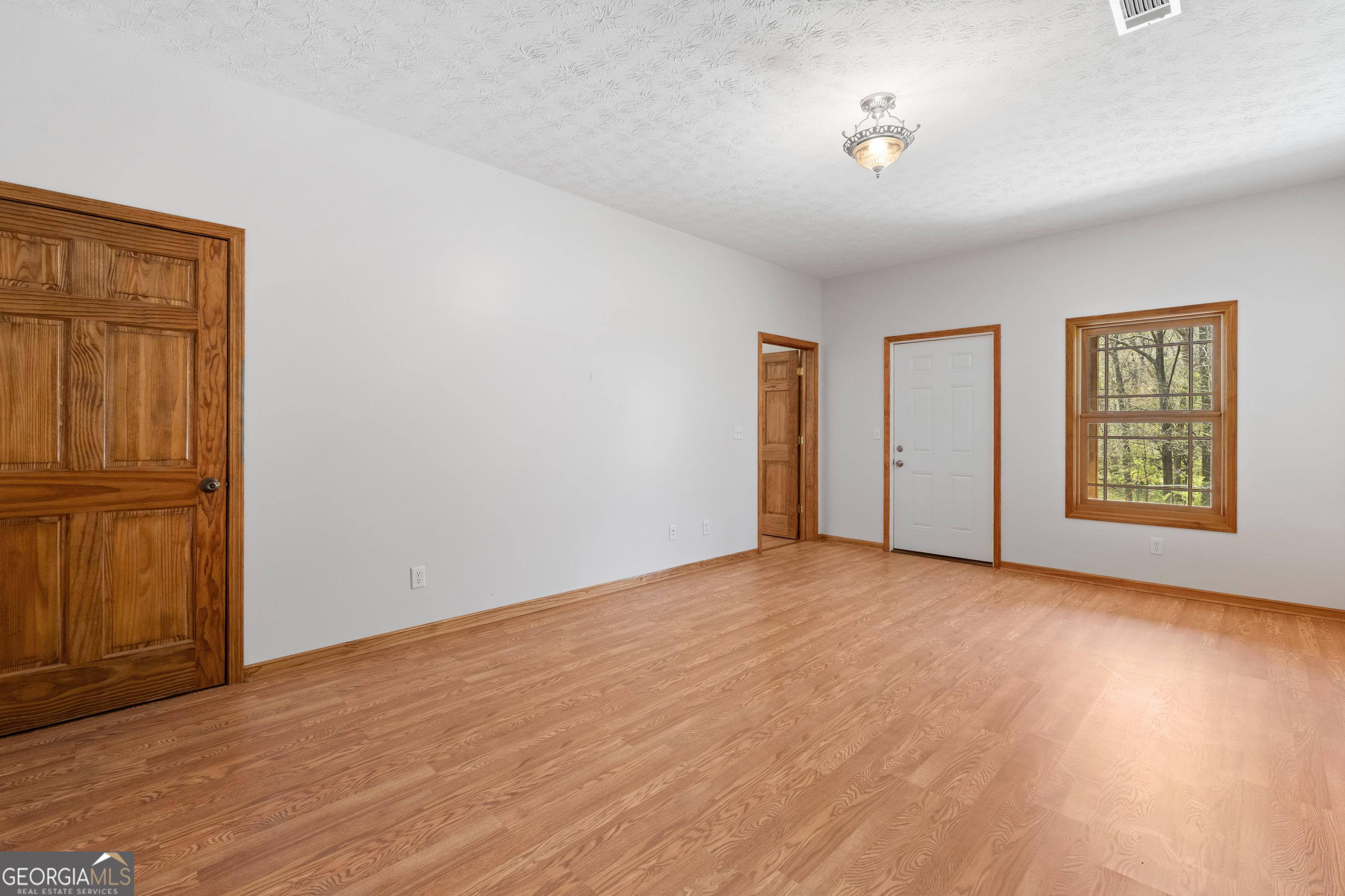 1229 Boggus Road Franklin, GA 30217 - Photo 38 of 68 a view of an empty room with a window