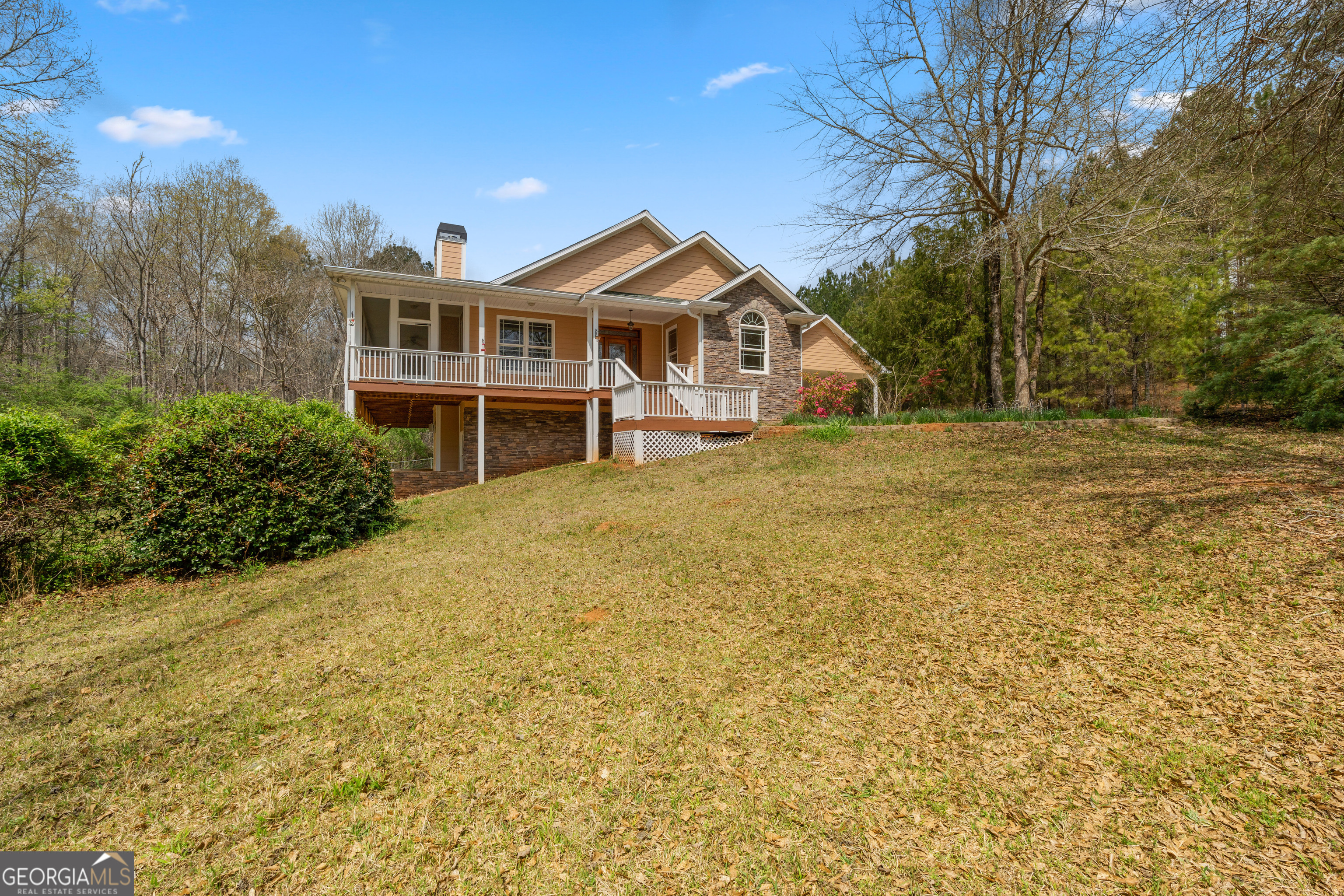 1229 Boggus Road Franklin, GA 30217 - Photo 4 of 68 a front view of a house with a yard