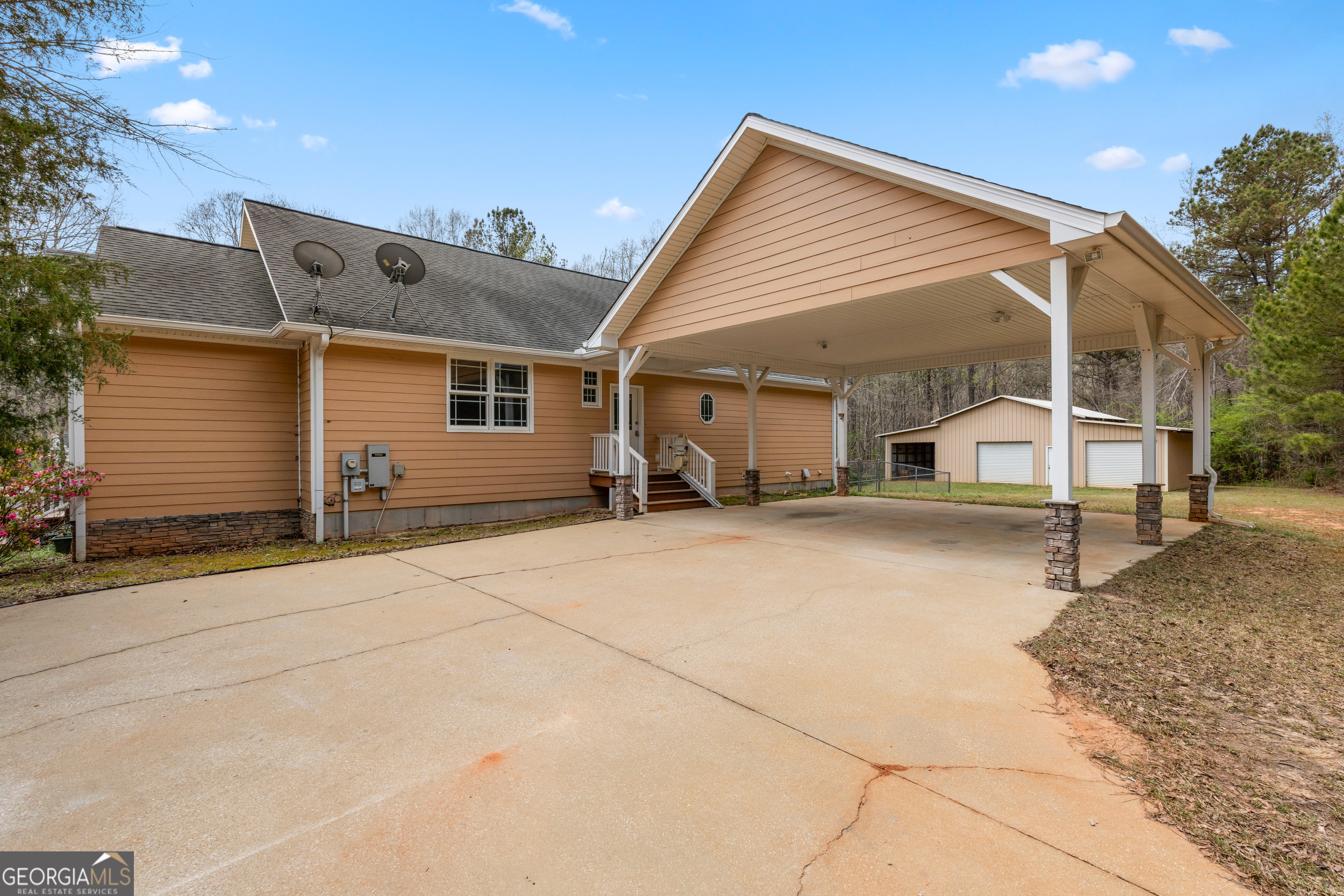 1229 Boggus Road Franklin, GA 30217 - Photo 47 of 68 a view of a white house with a large space