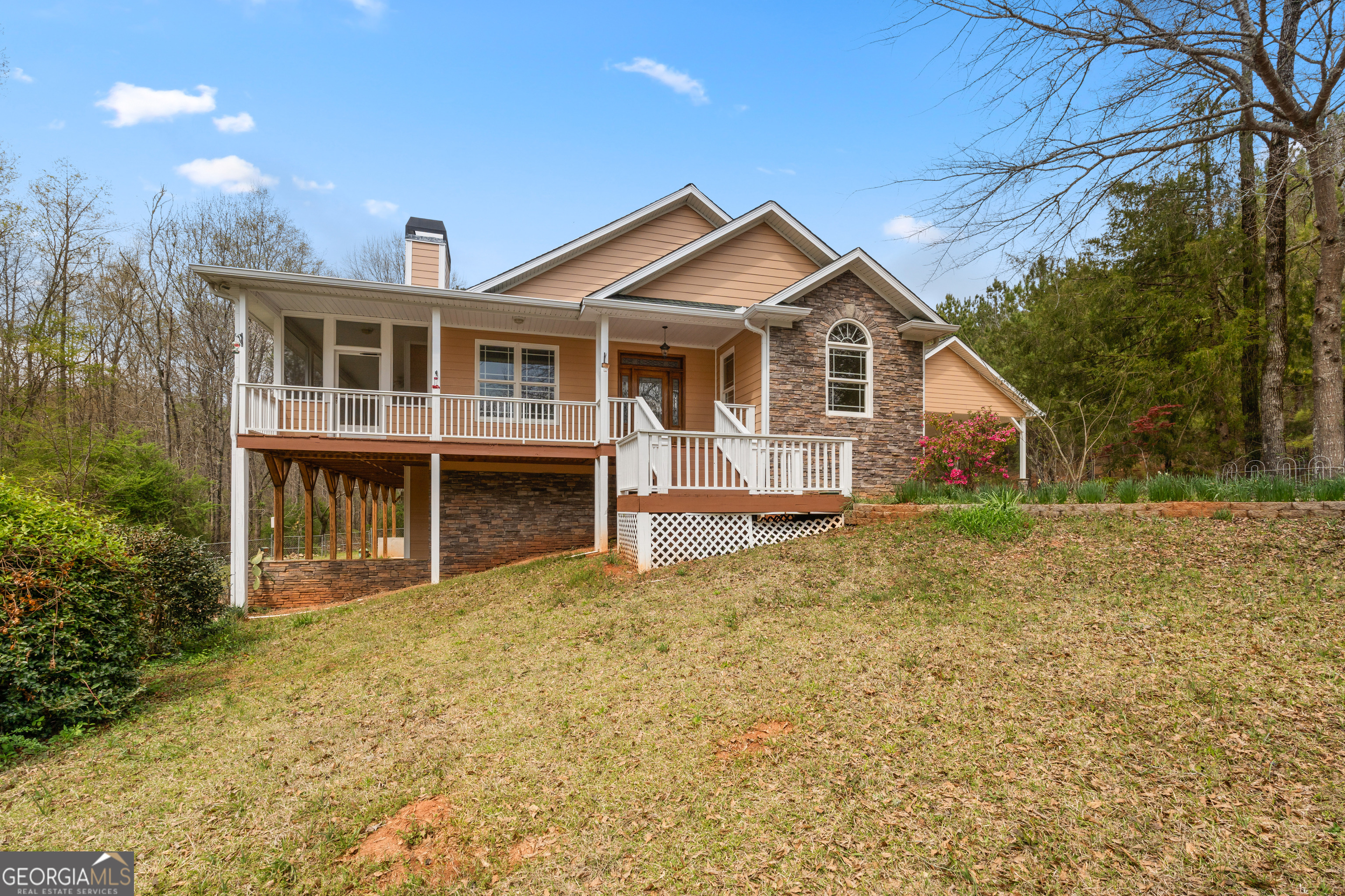 1229 Boggus Road Franklin, GA 30217 - Photo 5 of 68 a front view of a house with a yard