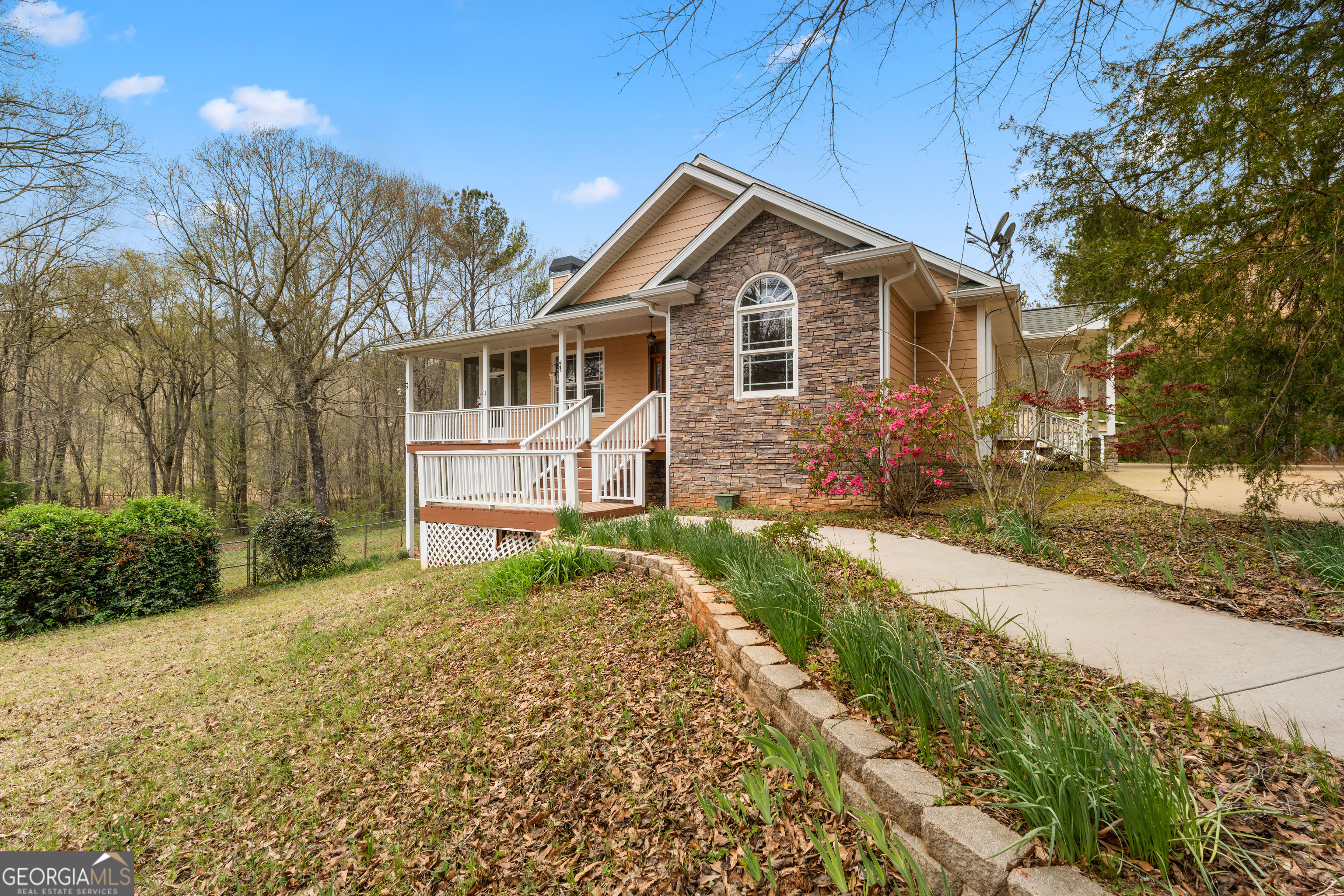 1229 Boggus Road Franklin, GA 30217 - Photo 6 of 68 a front view of a house with a yard