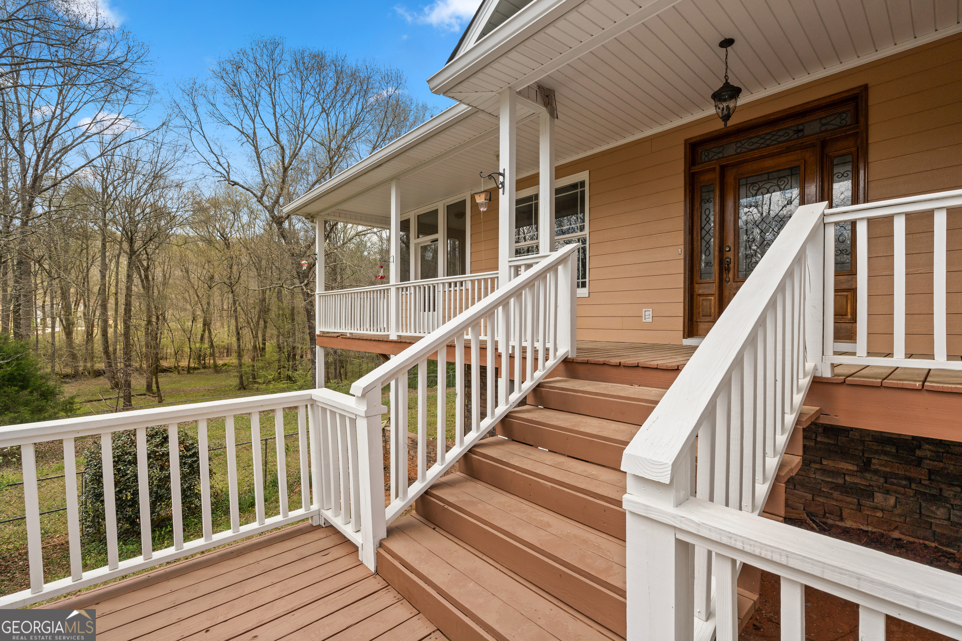 1229 Boggus Road Franklin, GA 30217 - Photo 7 of 68 a view of balcony with wooden floor and fence