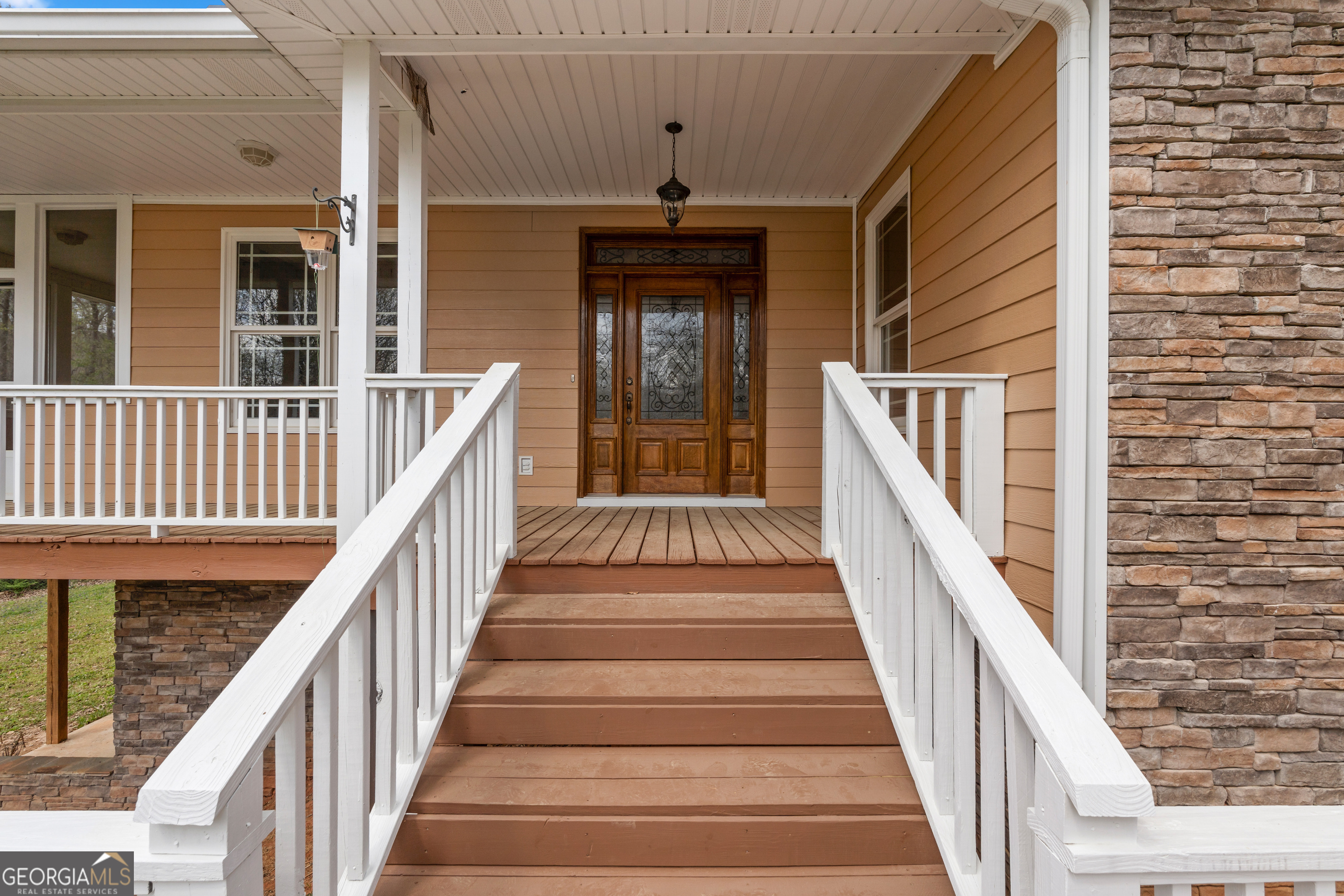 1229 Boggus Road Franklin, GA 30217 - Photo 8 of 68 a view of staircase with railing and white walls