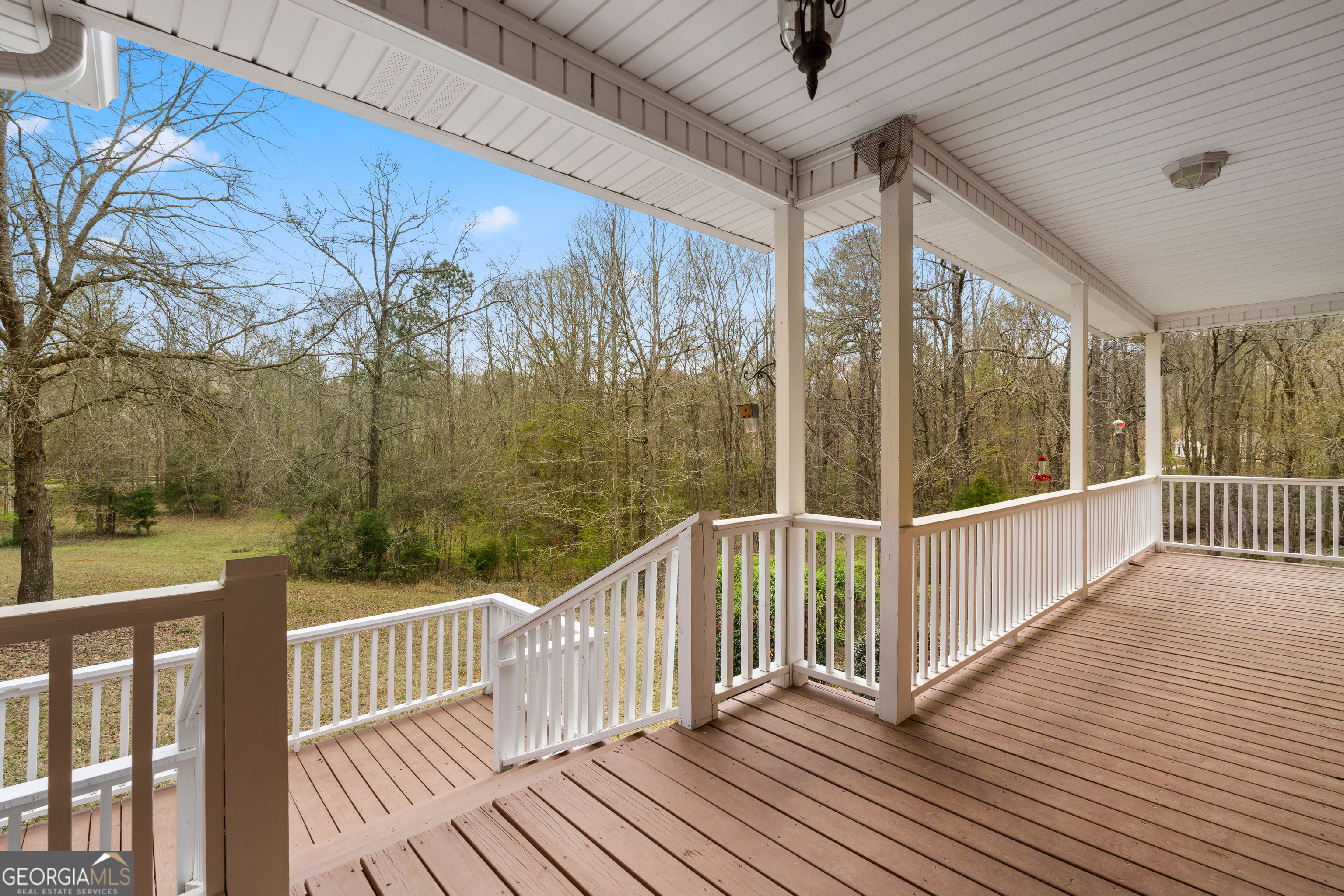 1229 Boggus Road Franklin, GA 30217 - Photo 9 of 68 a view of a balcony with wooden floor