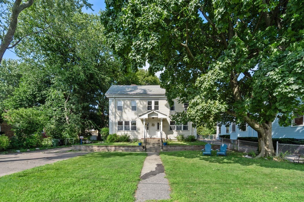 21 Fayette Street Watertown, MA 02472 - Photo 1 of 25 a front view of a house with a yard