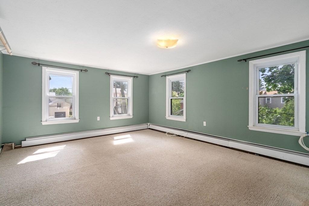 21 Fayette Street Watertown, MA 02472 - Photo 17 of 25 an empty room with windows