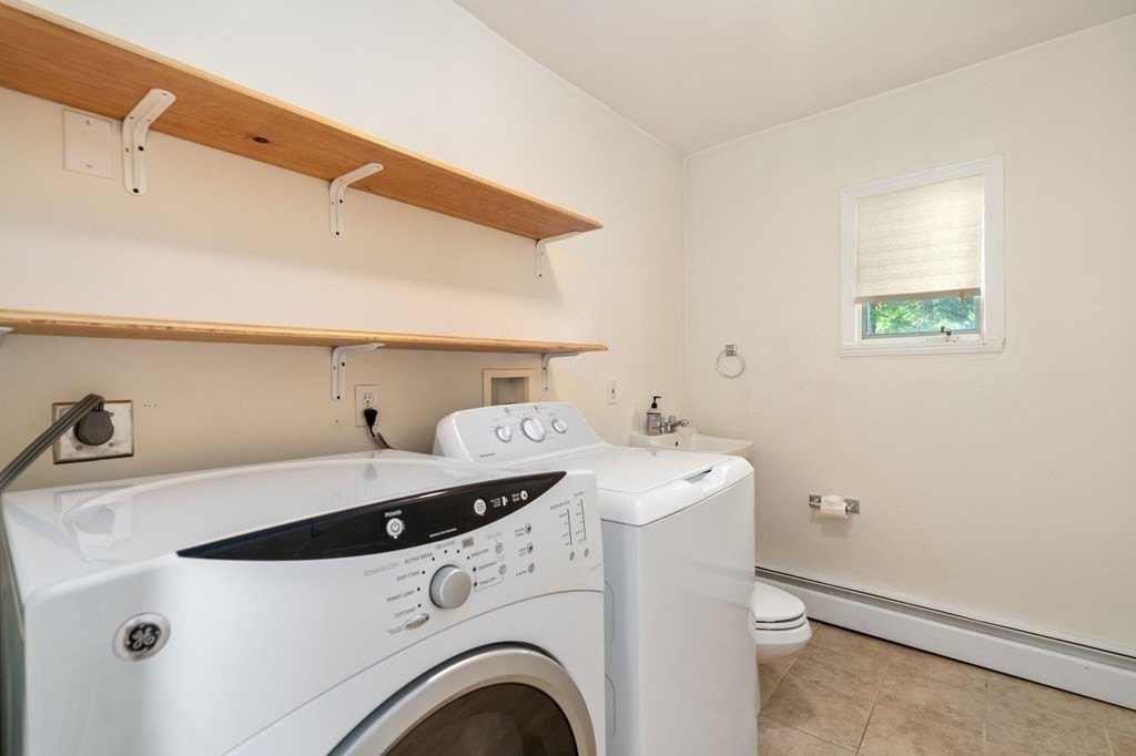 21 Fayette Street Watertown, MA 02472 - Photo 20 of 25 a utility room with dryer and washer
